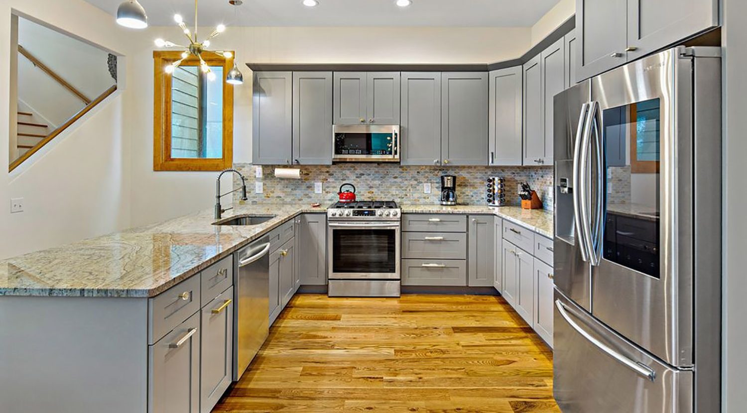 Upstream Way Penthouse Kitchen and Staircase Upstream Way Penthouse Kitchen and Staircase